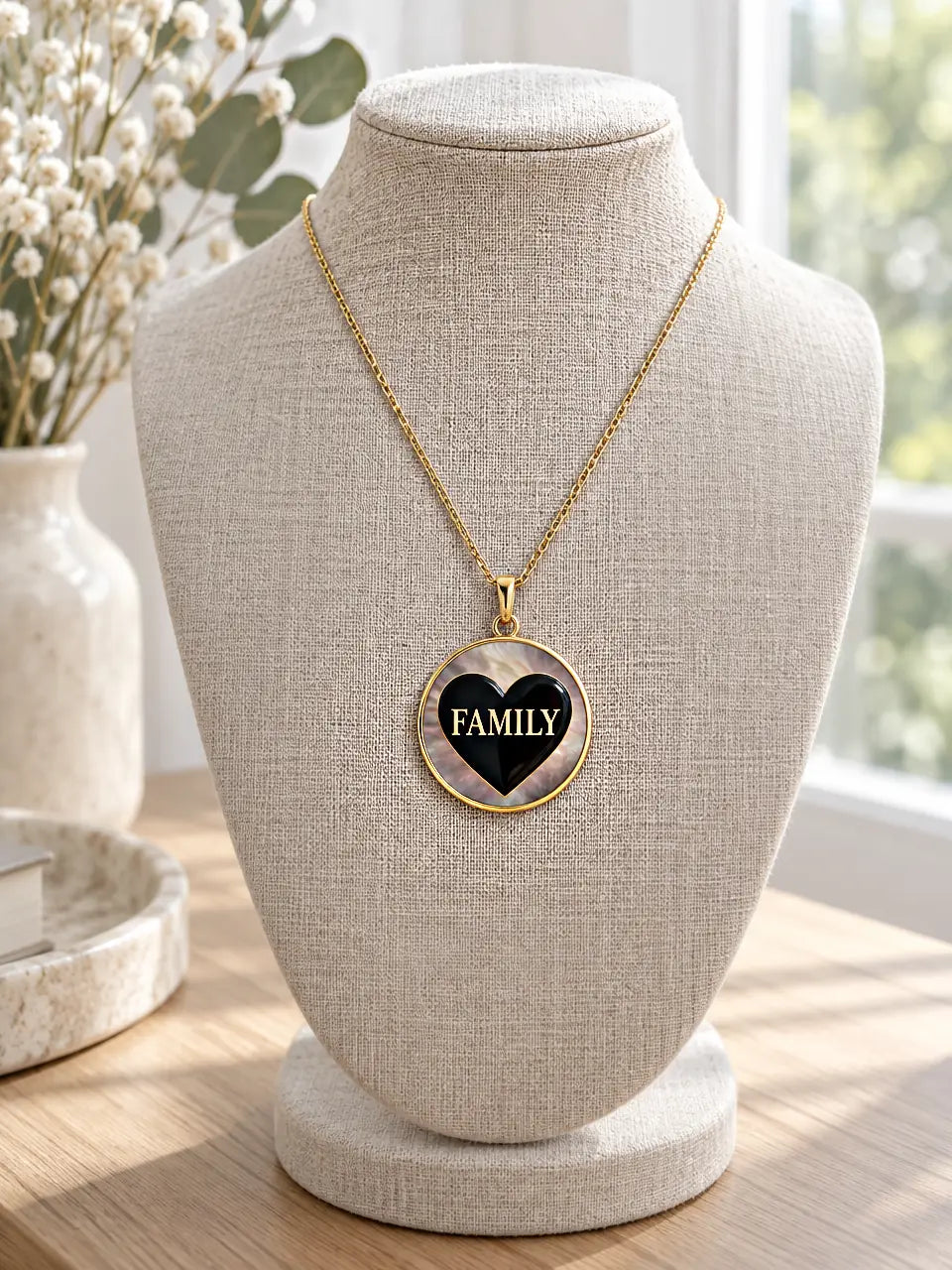 Family heart pendant necklace: black heart with the word FAMILY in gold, 14K gold and mother-of-pearl