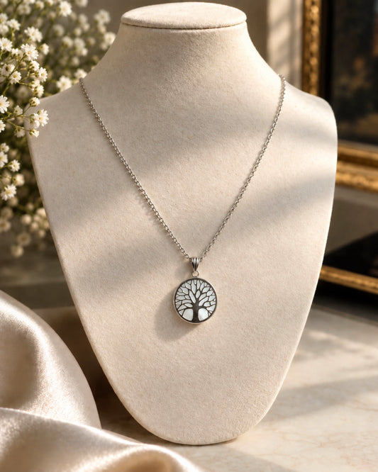 14K white gold Tree of Life pendant necklace on a jewelry bust