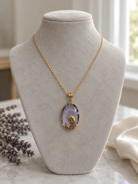 Lavender stone Virgin Mary pendant necklace in 14K gold on a jewelry bust